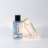 Flacon pulvérisateur de parfum cylindrique transparent en verre de 30 ml/50 ml avec fond en forme de montagne, couleur personnalisée, logo, sans diffuseur à bâtonnets