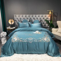 Parure de lit de luxe en coton doux et soyeux avec motif floral brodé bleu