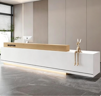 Bureau d'accueil moderne sur mesure effet marbre avec éclairage LED multicolore pour bureau, hôtel, hall d'entrée