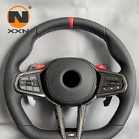 Volant en carbone sec en gros compatible avec G05 X5 G06 X6 G07 X7, remplacement OEM, accessoires de modification automobile