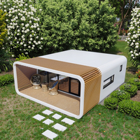 La plus grande maison modulaire pliable Bâtiments de jardin vert Paquet plat Préfabriqué Grande maison Cabine Apple Capsule spatiale Maison