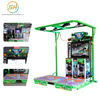 Grande salle d'arcade de jeux vidéo à monnayeur avec commandes gestuelles et mouvements de pieds, idéale pour les adultes pour danser et profiter de jeux musicaux