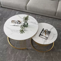 Table basse ronde moderne en marbre et métal de luxe pour salon et hôtel, durable et facile à nettoyer