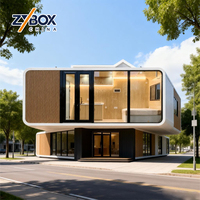 Maison préfabriquée modulaire à toit plat à deux étages, maisonnette conteneur, capsule, cabane Apple, vitrine en verre, magasin, bureau 20ft 40ft
