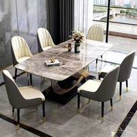 Table et chaises de salle à manger rectangulaires modernes et simples en marbre de roche italien de luxe léger, sans peinture, haut de gamme, en métal écologique