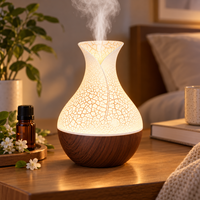 Diffuseur d'arômes et humidificateur d'air créatif en forme de vase étoilé ajouré