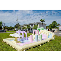 Toboggan aquatique commercial gonflable arc-en-ciel pastel au prix de gros