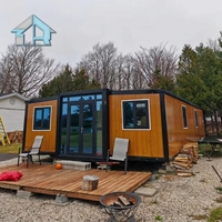 Produit phare : Mini-maison mobile préfabriquée de 20 pieds, résistante à la chaleur, mince, durable et fonctionnelle, pour usage résidentiel et bureautique en milieux de vie et de travail quotidiens