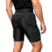 Shorts de football rembourrés en mousse EVA personnalisée, légers, flexibles et lavables en machine, avec protection intégrée et compression.