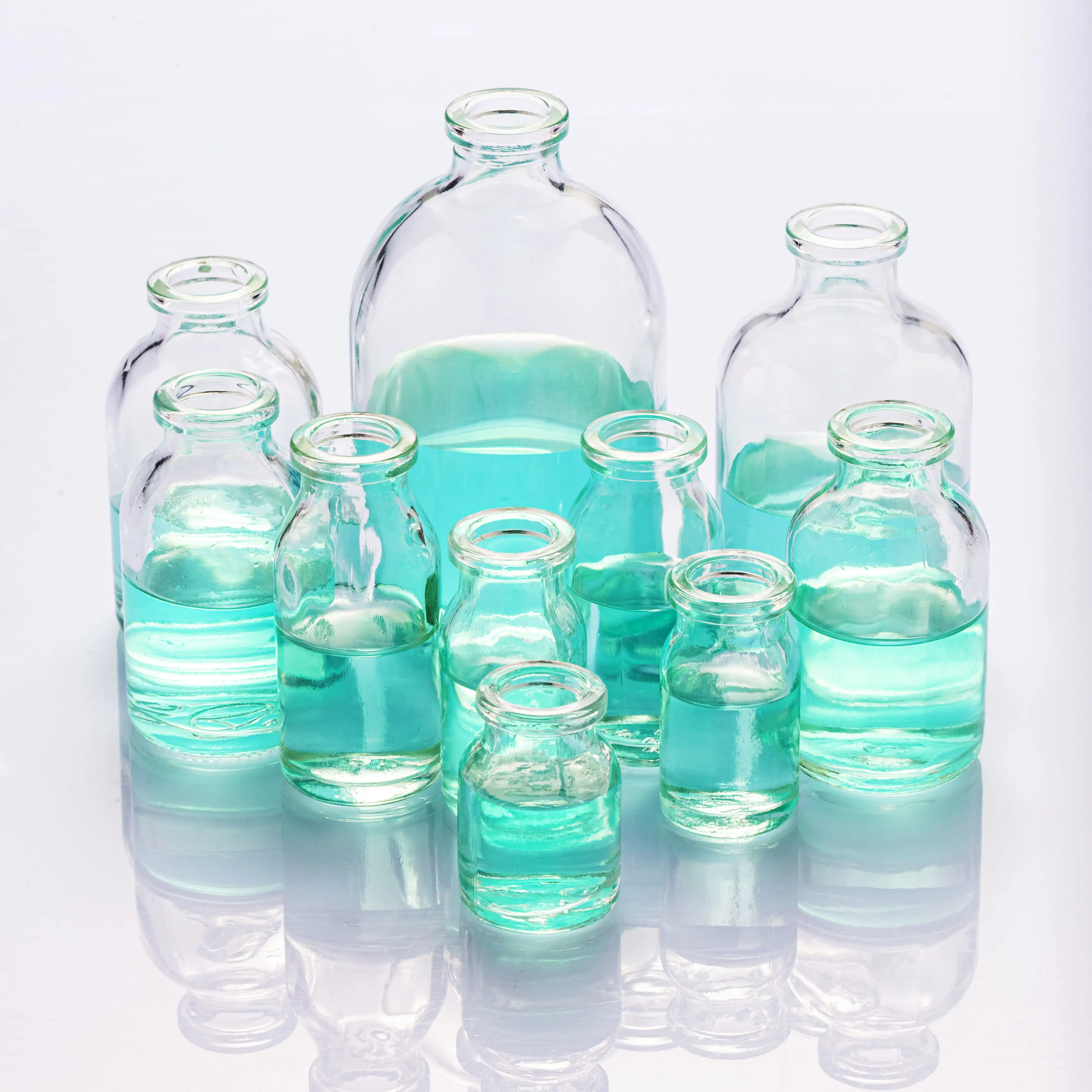Homay Packaging Atacado moldado injetar frascos de vidro medicinal com tampa para medicina líquida