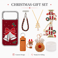 Ensemble cadeau d'accessoires de Noël personnalisés en usine : clochettes de renne, coque de téléphone, cordon de poignet, porte-clés pour iPhone 18 17 Pro Max