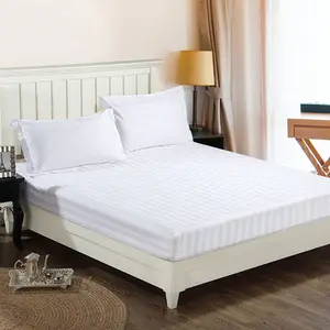 Protector de colchón de sábana ajustable con sensación de tira de satén de algodón 100% de lujo para hotel y hogar