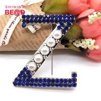 Broche personnalisée Zeta Phi Beta Sorority en alliage de zinc avec strass bleus et perle lettre Z, accessoires de mode pour femmes