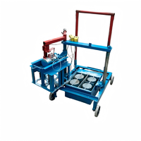Machine à fabriquer des briques RongDing Henan, modèle 2-45, manuelle et mobile, pour blocs creux avec ciment, 220V-380V, garantie 1 an, facile à utiliser