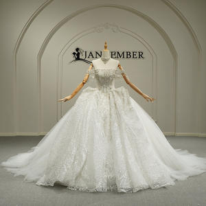 Vestido de Novia Largo hasta el Suelo con Cuello Barco Tradicional, Apliques de Encaje y Cristales, Borlas y Lentejuelas, Cola Capilla, Modelo GT26037 para Mujer - Product Image 1