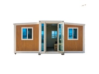 Maison conteneur préfabriquée extensible de 20 pieds à toit plat, aménagement ouvert, entièrement personnalisable pour studio