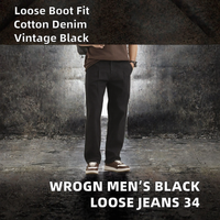Jeans vintage coupe bootcut en pur coton pour homme |   Détail plissé sur le devant |   Coupe ample |   Taille mi-haute |   Lavage moyen |   Noir |   34