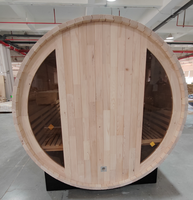 Luxuriöse Outdoor-Fass-Sauna mit schwarzem Asphaltschindeldach, Glastür und traditionellen Dampfoptionen für Haus, Garten und Spa