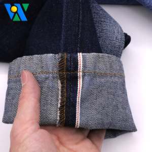 12.3온스 셀비지 데님 원단 다크 인디고 무신축 워프 슬럽 트윌 직조 100% 코튼 데님 원단 롤 중간 두께 도매 - Product Image 5