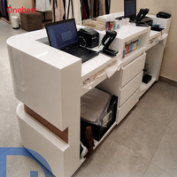Comptoir de réception, comptoir de caisse, mobilier pour bijouterie, table frontale en pierre artificielle sur mesure, étagères