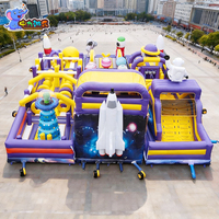 Parc de jeux gonflable géant personnalisé en usine avec château gonflable et toboggan extérieur