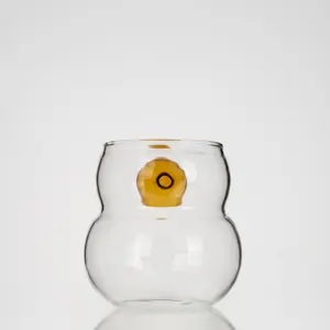 Taza de agua de vidrio con forma de calabaza de borosilicato resistente al calor transparente hecha a medida con mango de bola hueca