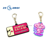 Zeamor Vente en gros de haute qualité Personnalisation LOGO Cadeau personnalisé Porte-clés en silicone Porte-clés en caoutchouc souple 2D PVC en vrac