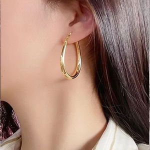 Xinfly Latest Fashion Hypoallergenic AU750 18K Pure Gold Teardrop Oval Chunky <b>Large</b> Lady Big <b>Hoop</b> Earrings for Woman - Product Image 5