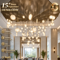 Lustre LED long moderne personnalisé Senfey avec hauteur réglable pour l'éclairage de grands projets tels que les atriums d'hôtels et les escaliers