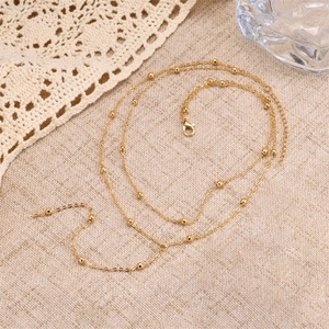 Collier ras-de-cou double rangs en acier inoxydable plaqué or avec chaîne perlée en Y pour femme, idéal pour les soirées - Product Image 6