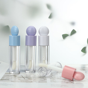 Tubo de brillo de labios esférico transparente de 6ml con tapa rosa Botella de esmalte de labios cosmético en forma de corazón blanco - Product Image 1