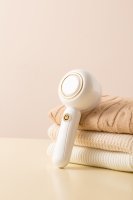 Dissolvant de peluches en plastique léger compact boulochage rasoir de vêtements fonction de chauffage électrique 1 an à la mode usage domestique