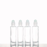 Flacon à rouleau en verre transparent de 15ml avec couvercle en or et rouleau en acier pour bouteille en verre à bille de parfum d'huile essentielle