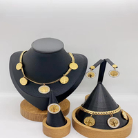Plaqué or 18 carats collier en os de serpent boucle fleur pendentif collier boucles d'oreilles bracelet bague en acier inoxydable ensemble de bijoux pour femmes