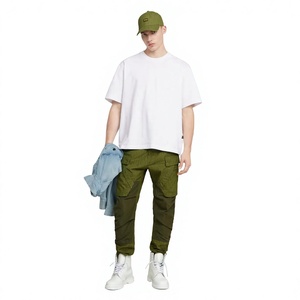 เสื้อยืดโอเวอร์ไซส์สีขาวสำหรับผู้ชาย แขนสั้น คอกลม ผ้าฝ้ายเรียบ สีพื้น สไตล์ลำลอง ทรงปกติ - Product Image 1