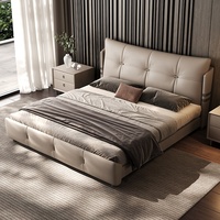 Cadre de lit en cuir véritable de luxe, design moderne minimaliste avec boucles métalliques, lit king size rembourré pour chambre principale