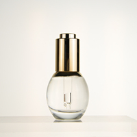 Échantillon gratuit de l'usine ampoule personnalisée forme ovale vide clair cosmétique 20ml compte-gouttes d'huile essentielle fond de teint bouteille en verre
