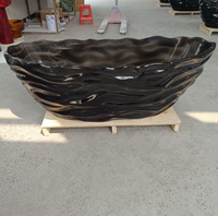 Baignoire autoportante en pierre de cristal noir en résine transparente à vagues colorées de design européen pour salle de bain