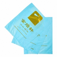 Sacs de courses en plastique PE personnalisés, portables, réutilisables, en forme de T-shirt, avec logo imprimé coloré pour les magasins et les cadeaux