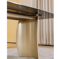 Table à manger rectangulaire moderne extensible contemporaine avec base en métal et plateau en pierre frittée
