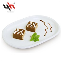 Vente en gros Grande assiette à steak ovale blanche en porcelaine avec chargeur Grande assiette ovale en céramique pour restaurant