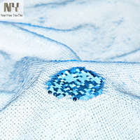 Tissu Nanyee Textile en satin brodé haute densité avec sequins réversibles blancs de 5 mm pour mariage, vêtements pour filles et textile de maison