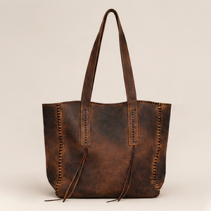 Sac fourre-tout vintage en cuir véritable marron pour femme Gravs avec fermeture à bouton magnétique, design spacieux et tendance pour l'été - Product Image 1