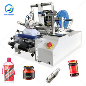 Machine d'impression d'étiquettes pour bouteilles rondes de sirop d'eau minérale semi-automatique à petite échelle OCEAN, étiquettes uniques pour boîtes de conserve de vin - Product Image 1