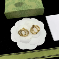 Vente en gros de bijoux de marque célèbre, collier, bracelet et boucles d'oreilles avec breloque lettre GG plaqué or