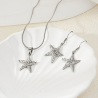 Vente en gros de boucles d'oreilles et de colliers en acier inoxydable anti-rouille, imperméables, délicats, en forme d'étoile, pour femmes