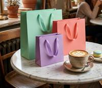 Eco Recycled Kraft Paperboard Packaging Bag UV Coating Cotton Rope Handles Custom Size Color for Boutique Hand Gifts Holiday
