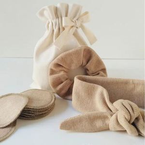Novedad: Coletero de algodón orgánico, banda para el pelo, almohadilla desmaquillante y bolsa con cordón para artículos populares. Productos de Año Nuevo 2025 para mujer. - Product Image 1