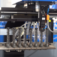 Centre d'insertion de fixations servo-électrique avec alimentation automatique pour écrous, goujons, entretoises et rivets pour tôles