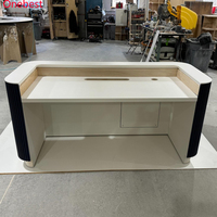 Bureau de réception bleu foncé Design d'intérieur Comptoir de spa de salon en Corian à surface solide contemporain sur mesure